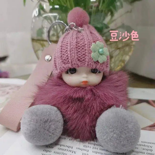 Add Charm to Your Belongings with the Cute Expression Face Baby Pompom Keychain! - Home Kartz