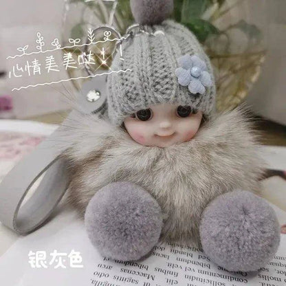 Add Charm to Your Belongings with the Cute Expression Face Baby Pompom Keychain! - Home Kartz